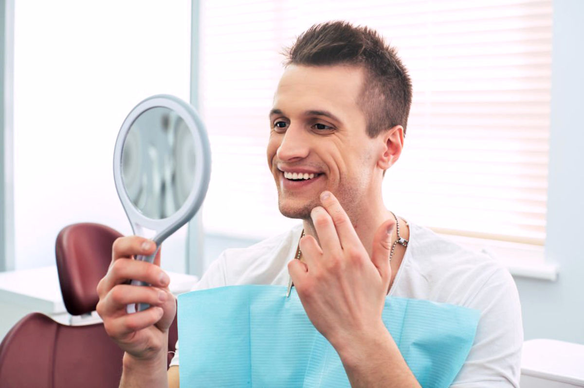 Recuperar dentes com tratamento dentário com implantes